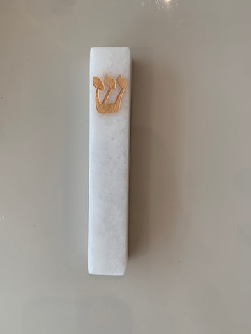 Snow white marble mezuza with classic gold shin